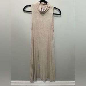 Lightweight dress, higher neck.